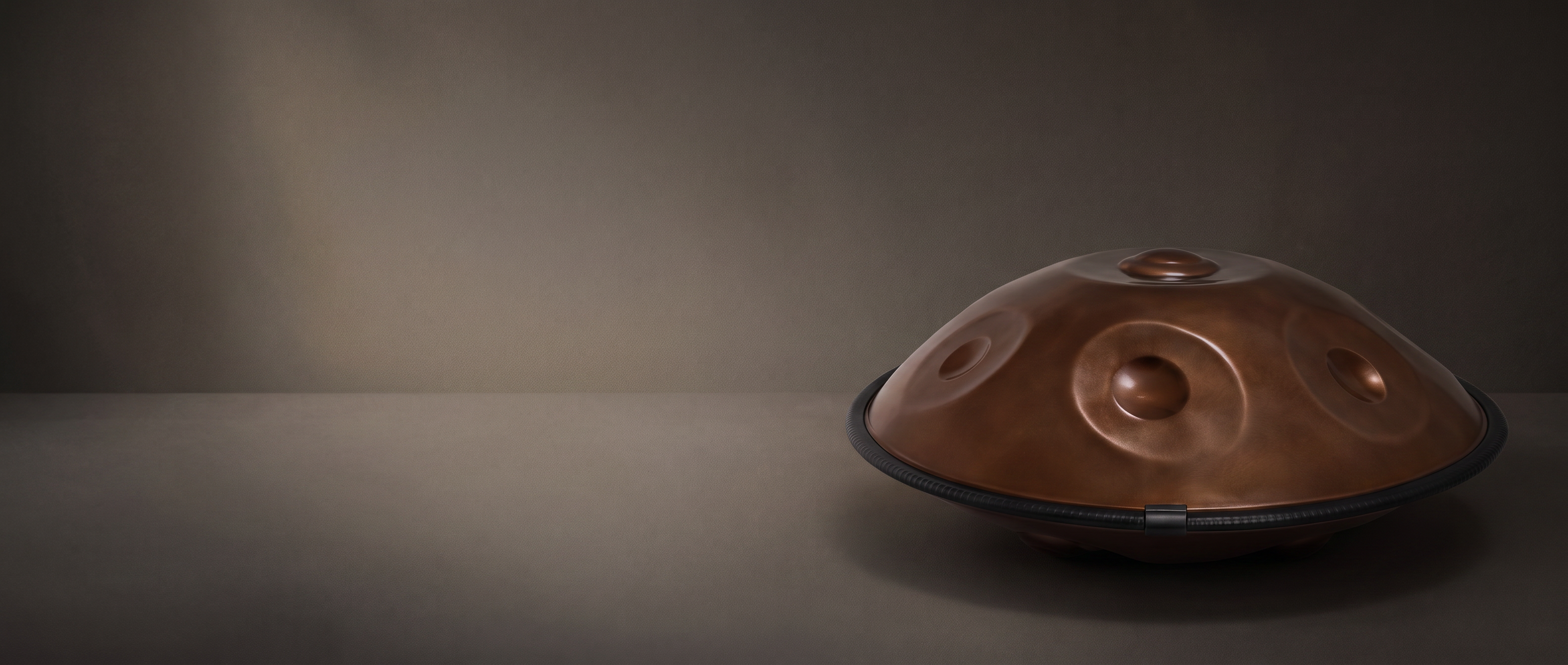 Use_the_previous_generated_newsletter_background_image_as_the_exact_composition_reference._Keep_the_same_handpan_placement_same_premium_minimal_layout_same_generous_negative_space_for.png